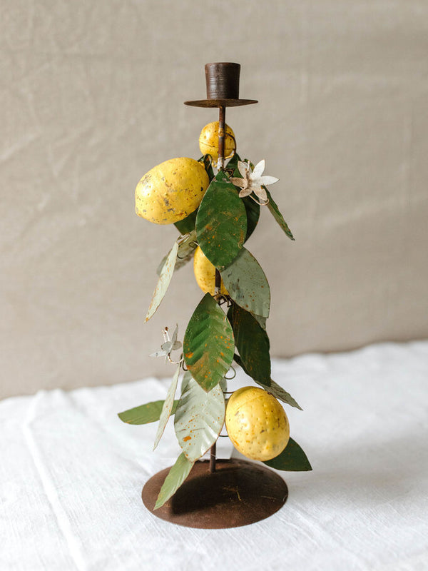 large metal taper holder with lemons and leaves