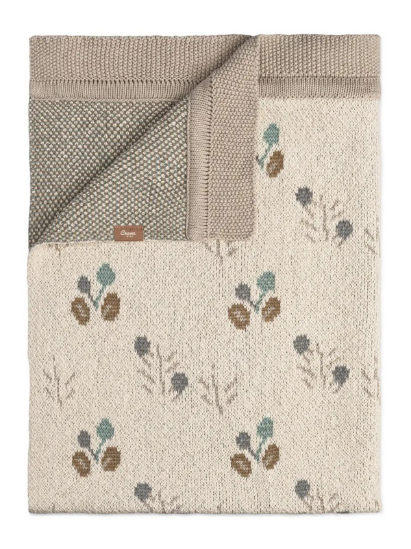 organic cotton poppy print knitted baby blanket