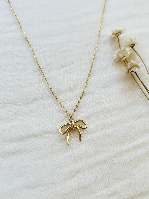 gold bow charm necklace