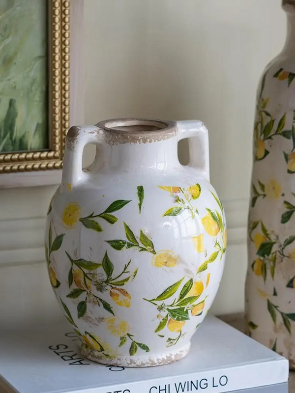 white ceramic vase with lemon motif and handles