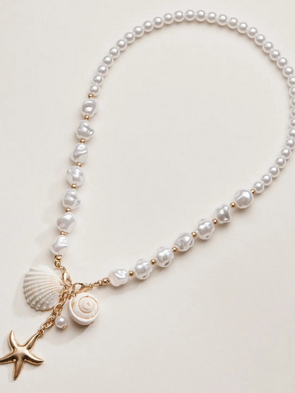 gold starfish and seashell pendant coastal charm pearl necklace