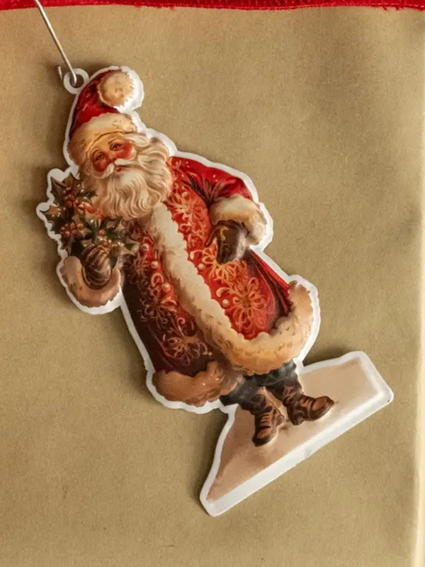 santa with holly ornament