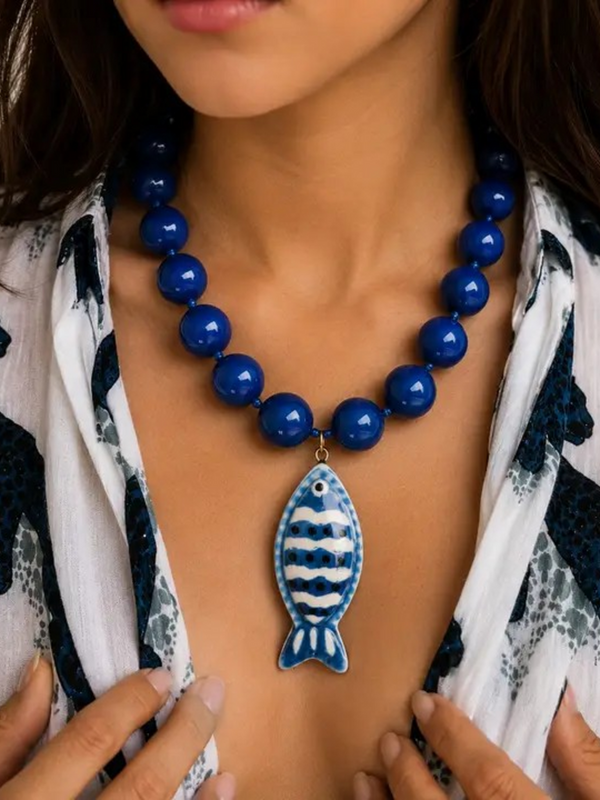 navy fish pendant beaded necklace