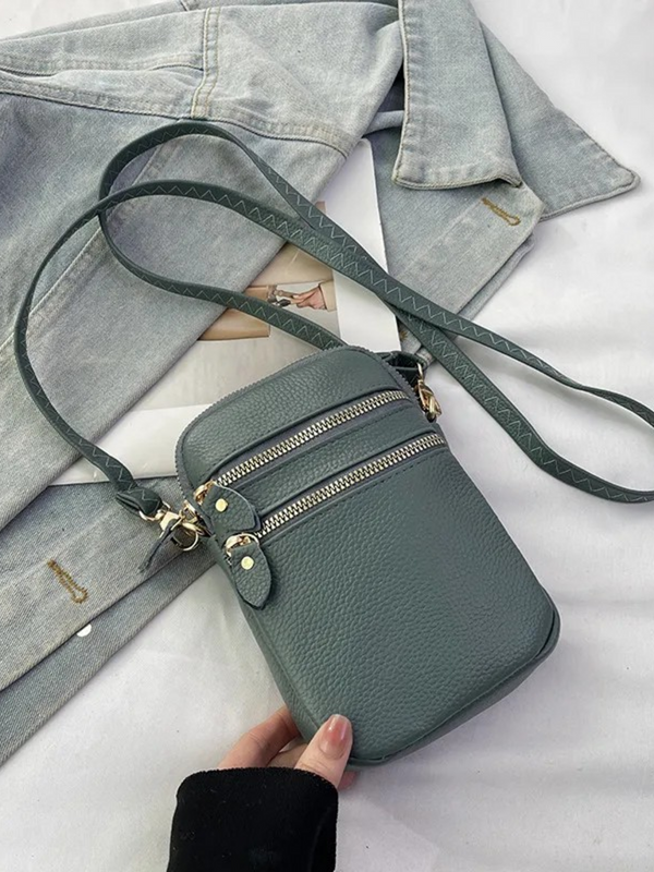 blue cross body leather handbag