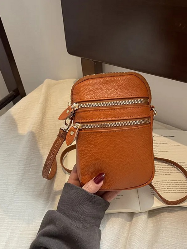 brown cross body leather handbag
