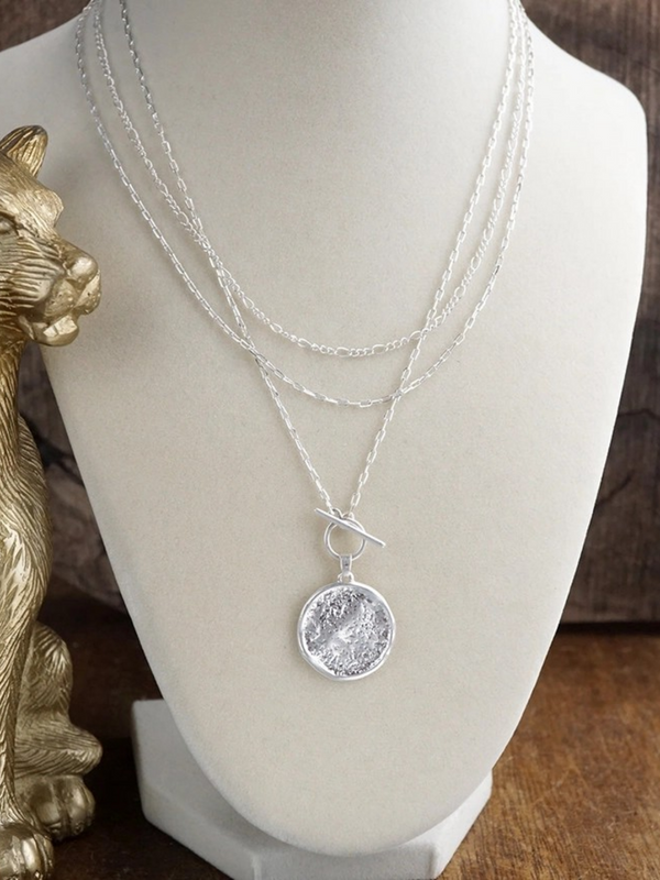 silver tone moon phase relic layered coin togglr necklace