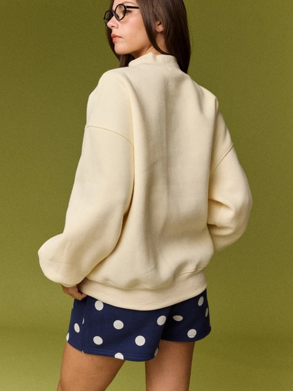 light yellow mock neck sweater
