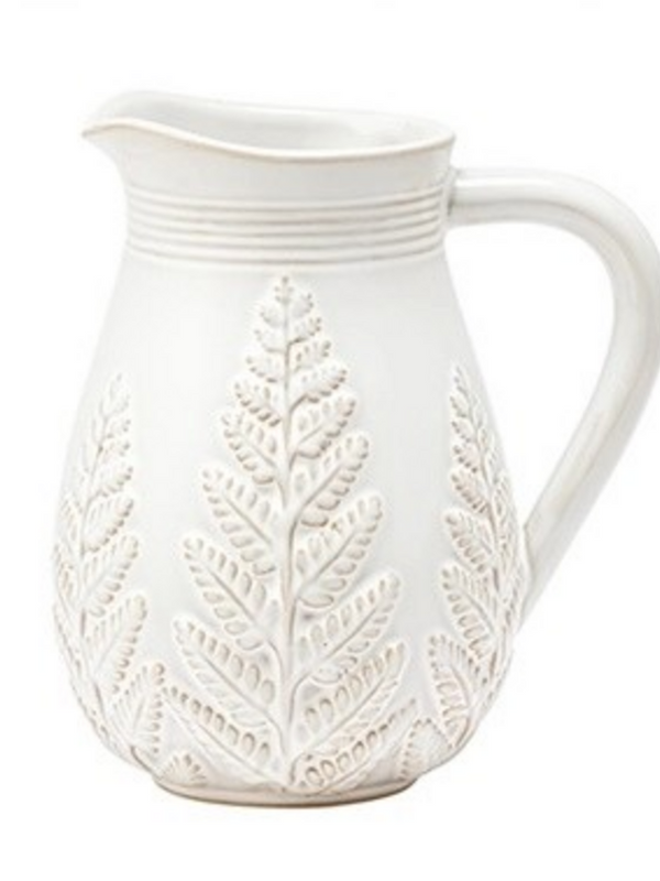 white pitcher with fern design