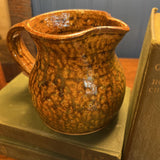 Neutral pottery pitcher