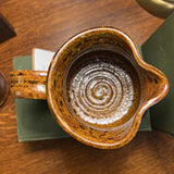 Neutral pottery pitcher