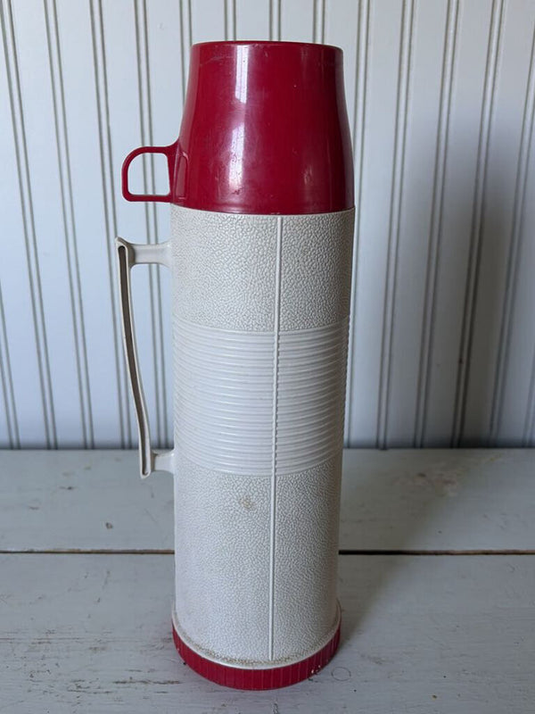 red and white thermos
