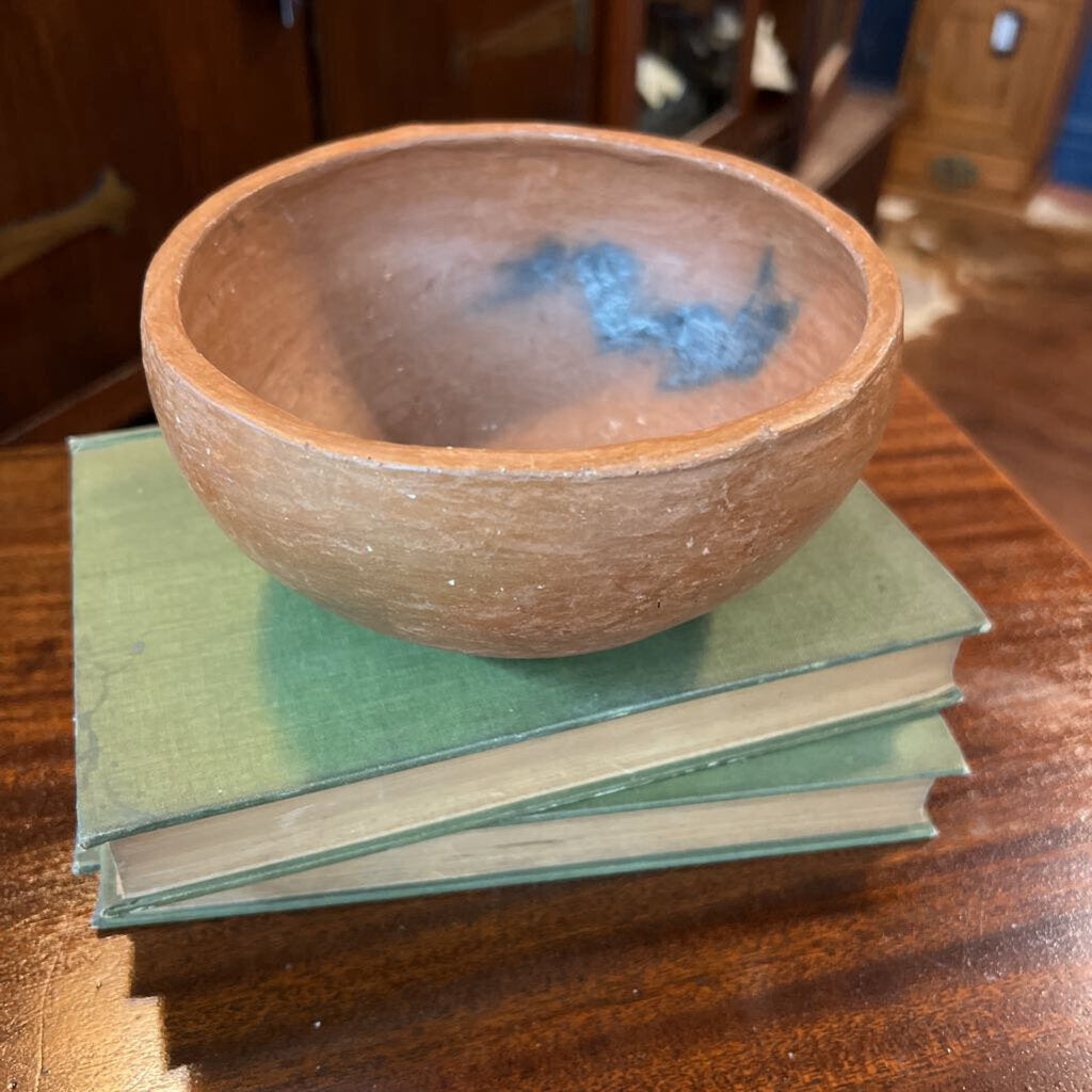 Handmade red clay pottery bowl with char