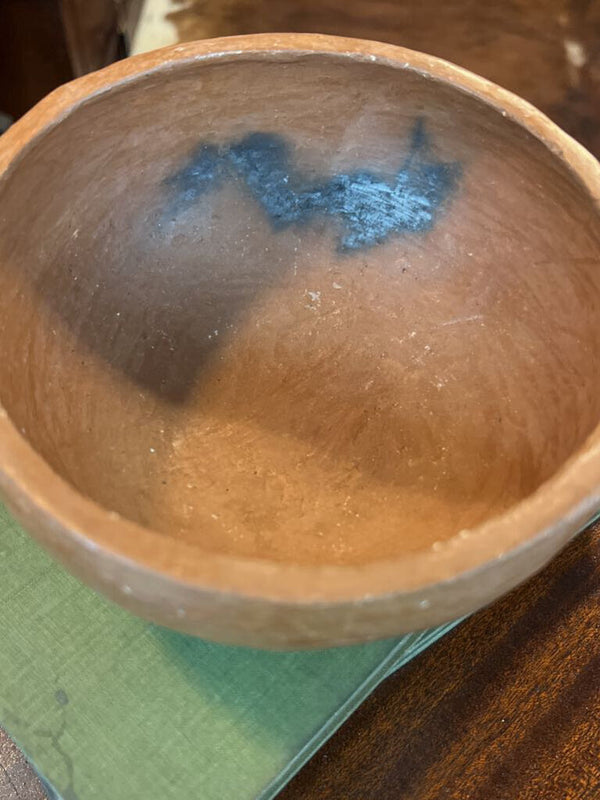 Handmade red clay pottery bowl with char