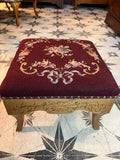 Burgundy floral needlepoint stool