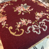 Burgundy floral needlepoint stool