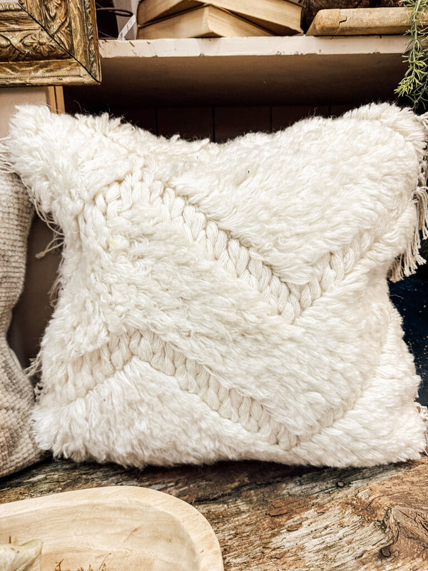 Handmade textile pillow with herringbone pattern