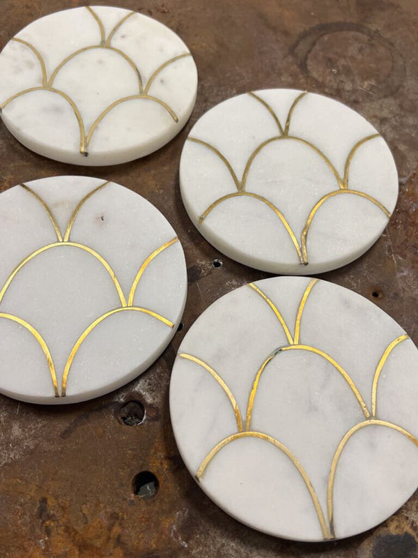 set of 4 marble coasters with gold design