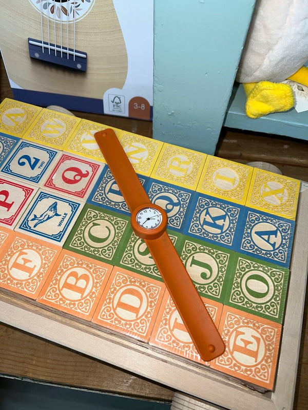 burnt orange slap bracelet watch
