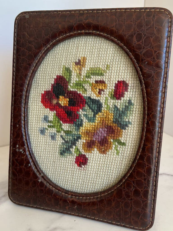 leather frame with floral cross stitch