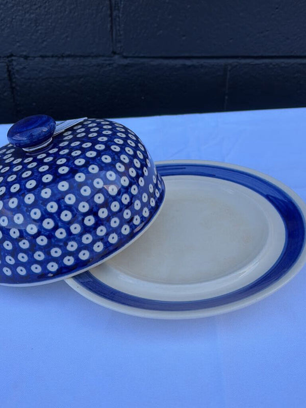 Polish pottery plate with cover in a blue and white pattern