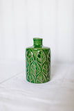 tall embossed green vase