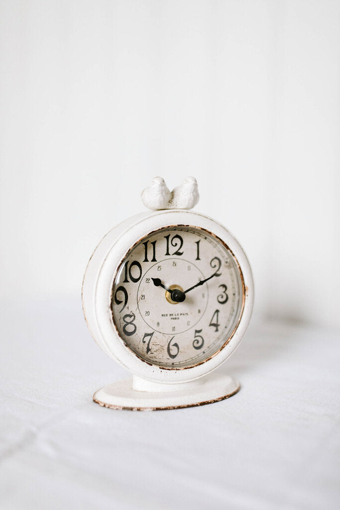 pewter mantel clock with birds in cream