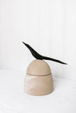 Clay canister with wood bird handle