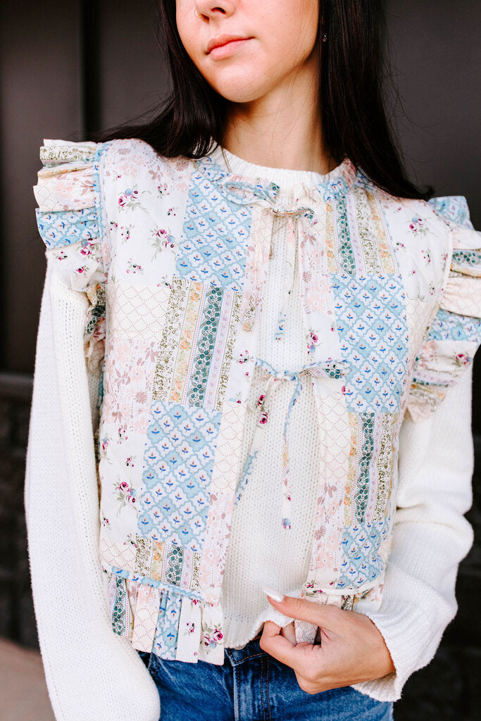 dusty blue floral quilted vest