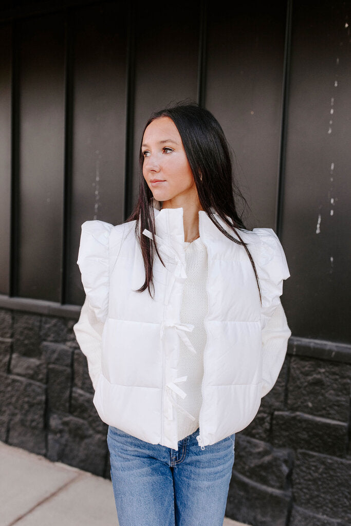 white ruffle puffer vest