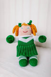 green and white cheerleader doll