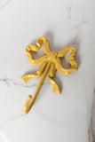 cast iron yellow bow wall hook