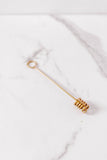 brass honey dipper