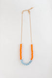 mixed orange African bead necklace