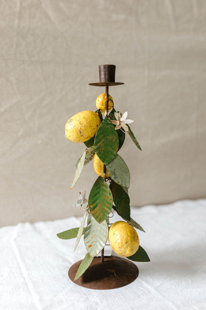 large metal taper holder with lemons and leaves