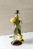 large metal taper holder with lemons and leaves