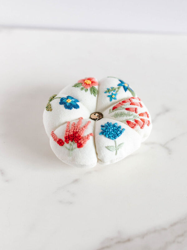 pink and blue pincushion