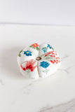 pink and blue pincushion