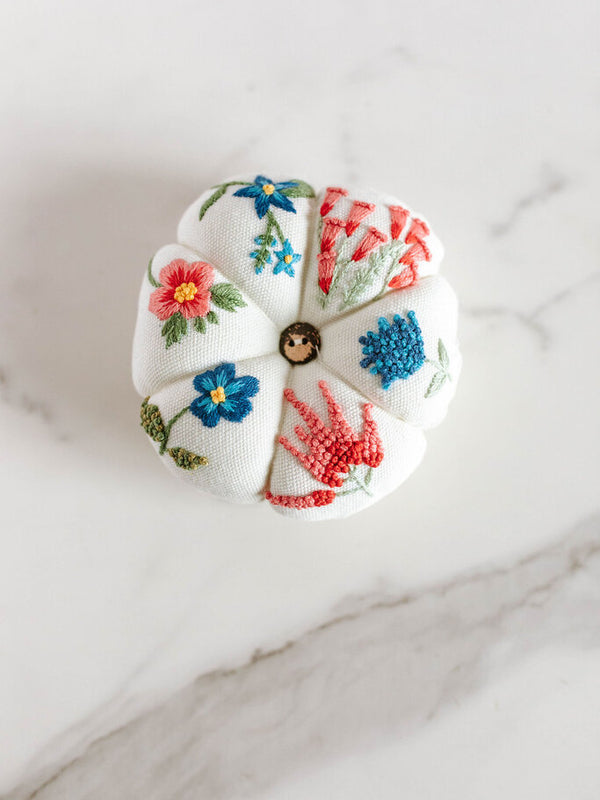 pink and blue pincushion