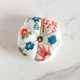 pink and blue pincushion