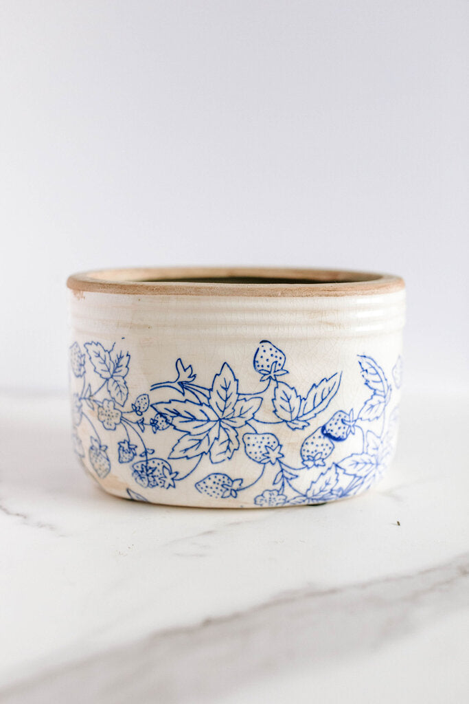 small stoneware oval planter with blue flowers