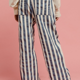 denim and off white striped pants with draw string waist