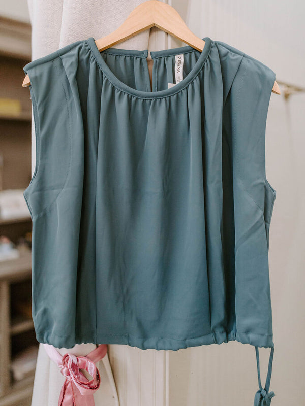 dusty blue woven drawstring tie side sleeveless top