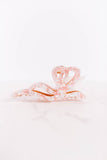 pink patterned bow hair claw