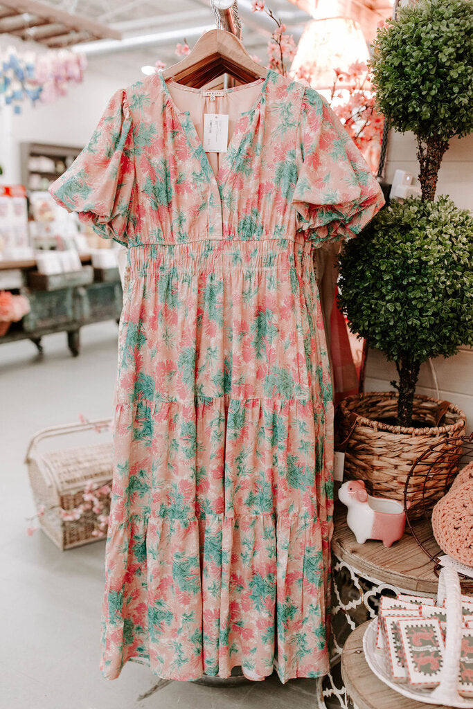 peach dress with leaf pattern