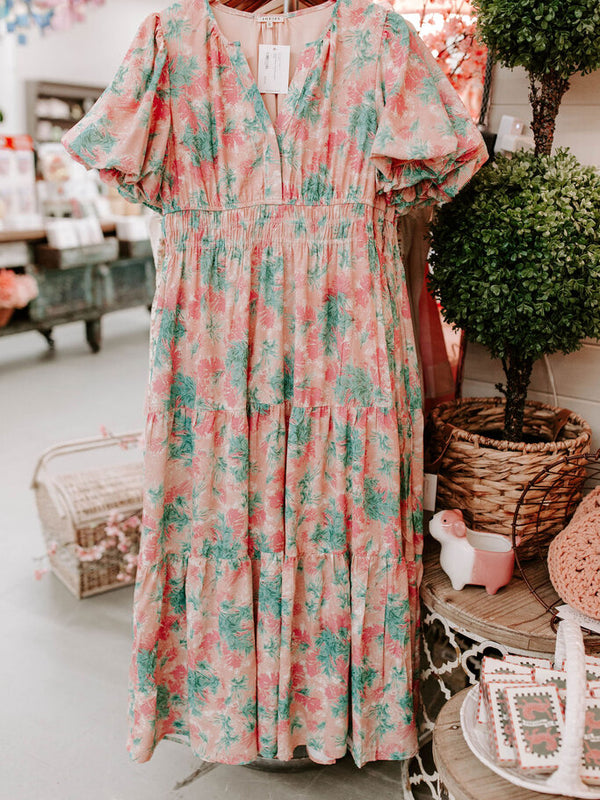 peach dress with leaf pattern