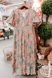 peach dress with leaf pattern