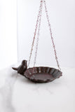cast iron hanging bird bath with bird