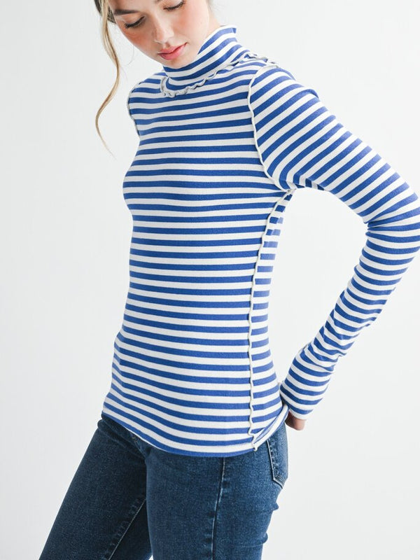 blue and white mock neck top