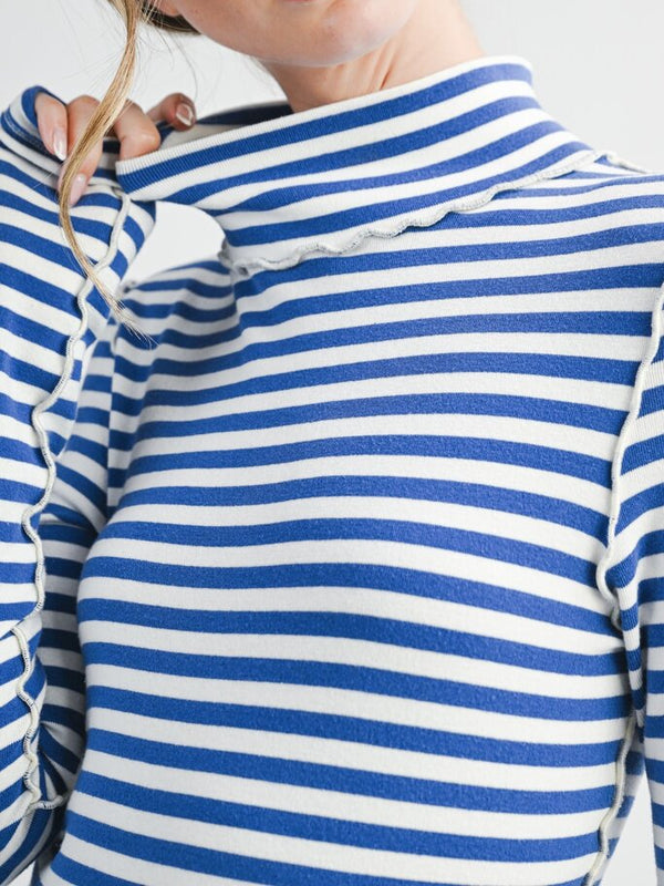 blue and white mock neck top