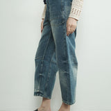 medium wash denim pants with eyelet waist
